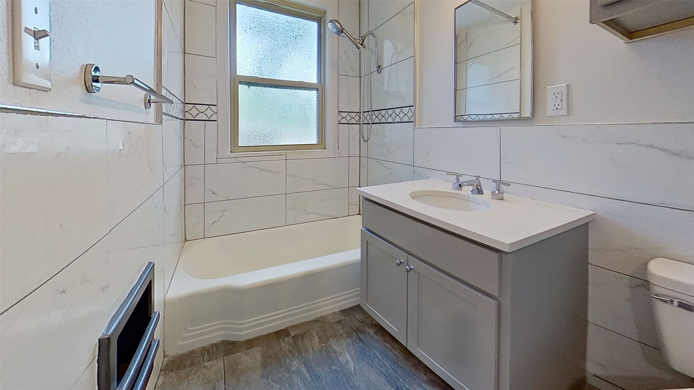 1703 Summit View Place, Unit A Austin, TX 78703 - Photo 4 of 13 A well-appointed bathroom with a spacious tub and sleek vanity.