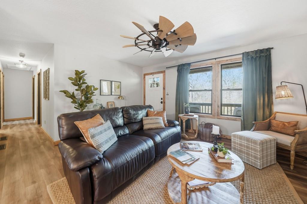 589 Spalding Circle Ellijay, GA 30540 - Photo 12 of 68 a living room with furniture and a large window