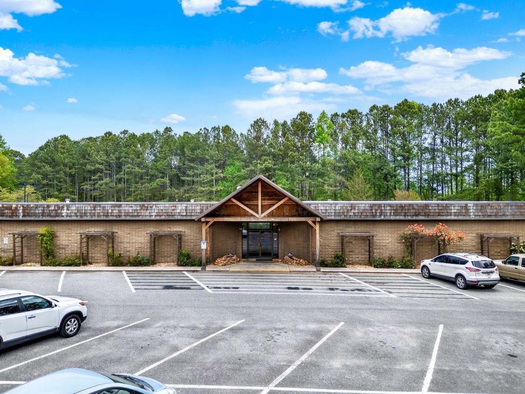 589 Spalding Circle Ellijay, GA 30540 - Photo 47 of 68 a front view of a house with a garden