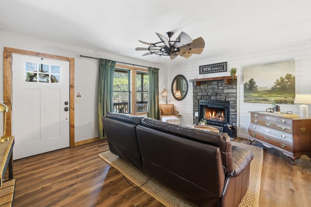 589 Spalding Circle Ellijay, GA 30540 - Photo 10 of 68 a living room with furniture and a fireplace