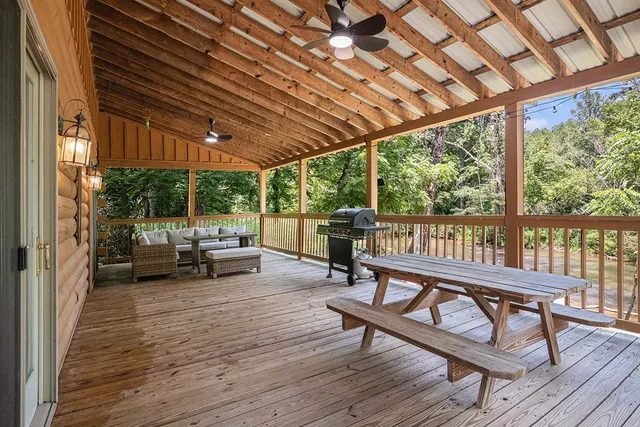 a view of a patio with wooden floor