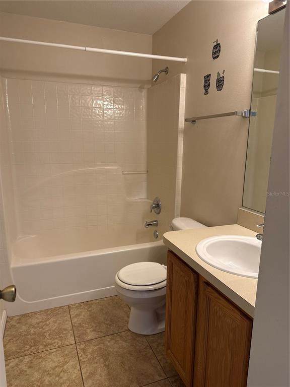 4725 Southwest 100th Street Ocala, FL 34476 - Photo 16 of 24 a bathroom with a sink a toilet and shower