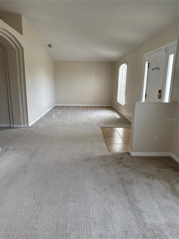 4725 Southwest 100th Street Ocala, FL 34476 - Photo 4 of 24 a view of empty room