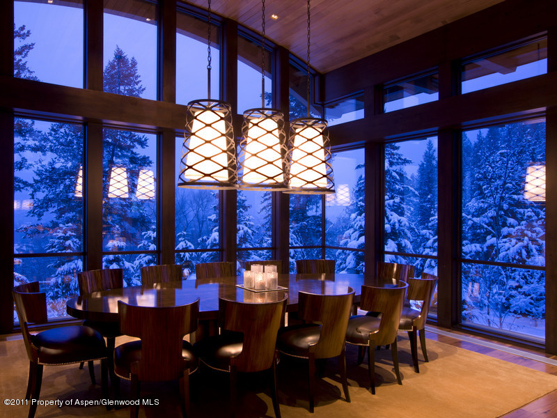 675 Aspen Alps Road South Aspen, CO 81611 - Photo 11 of 37 a view of a dining room with furniture and chandelier