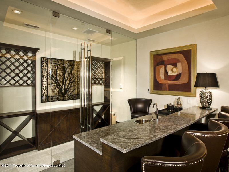 675 Aspen Alps Road South Aspen, CO 81611 - Photo 19 of 37 a dining room with furniture and window