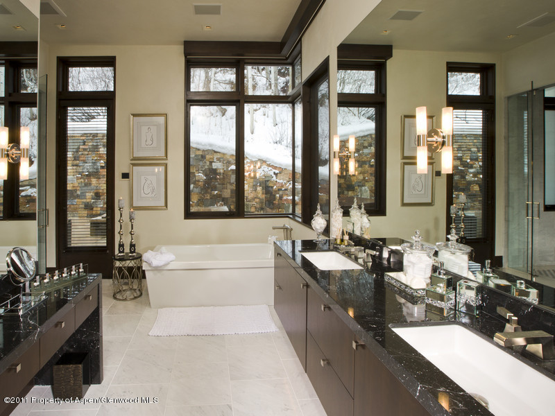 675 Aspen Alps Road South Aspen, CO 81611 - Photo 23 of 37 a large bathroom with a large tub and sink
