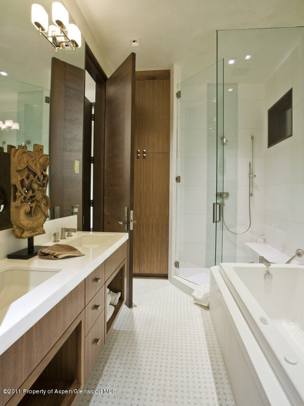 675 Aspen Alps Road South Aspen, CO 81611 - Photo 32 of 37 a spacious bathroom with a double vanity sink mirror and shower