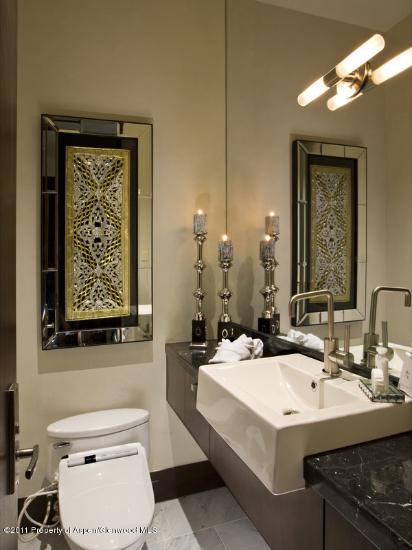675 Aspen Alps Road South Aspen, CO 81611 - Photo 35 of 37 a bathroom with a sink and a mirror