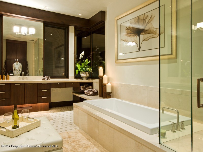 675 Aspen Alps Road South Aspen, CO 81611 - Photo 37 of 37 a bathroom with a tub sink and mirror
