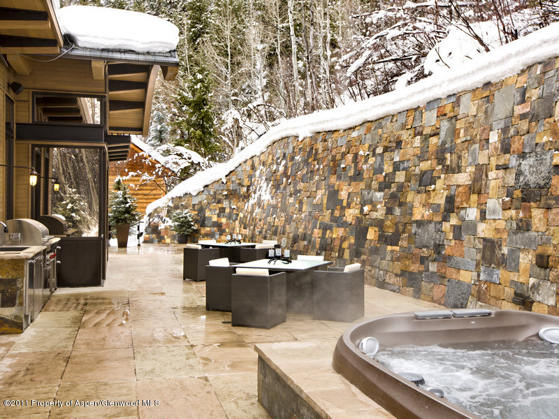 675 Aspen Alps Road South Aspen, CO 81611 - Photo 6 of 37 a view of swimming pool with outdoor seating