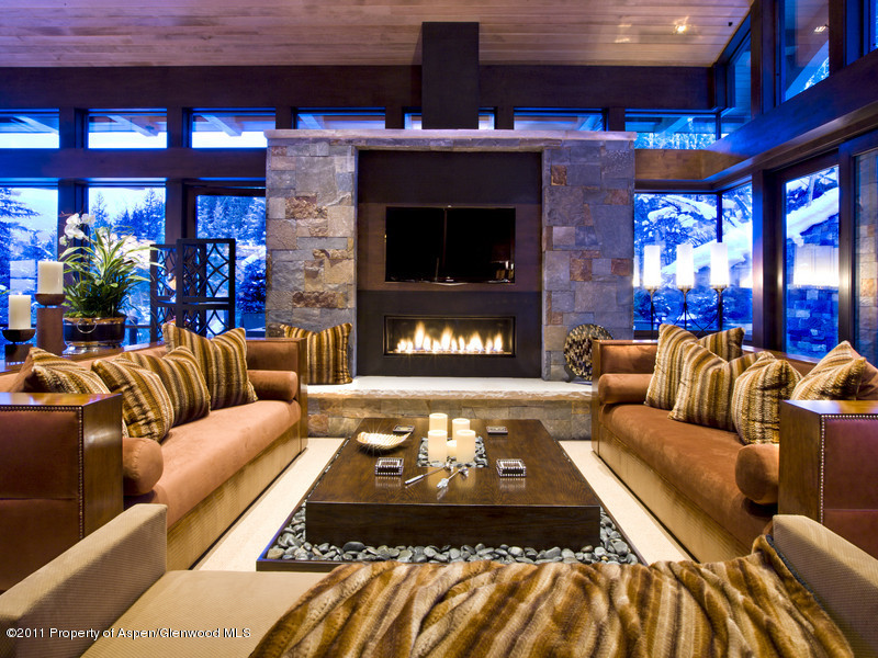 675 Aspen Alps Road South Aspen, CO 81611 - Photo 9 of 37 a living room with furniture and a fireplace