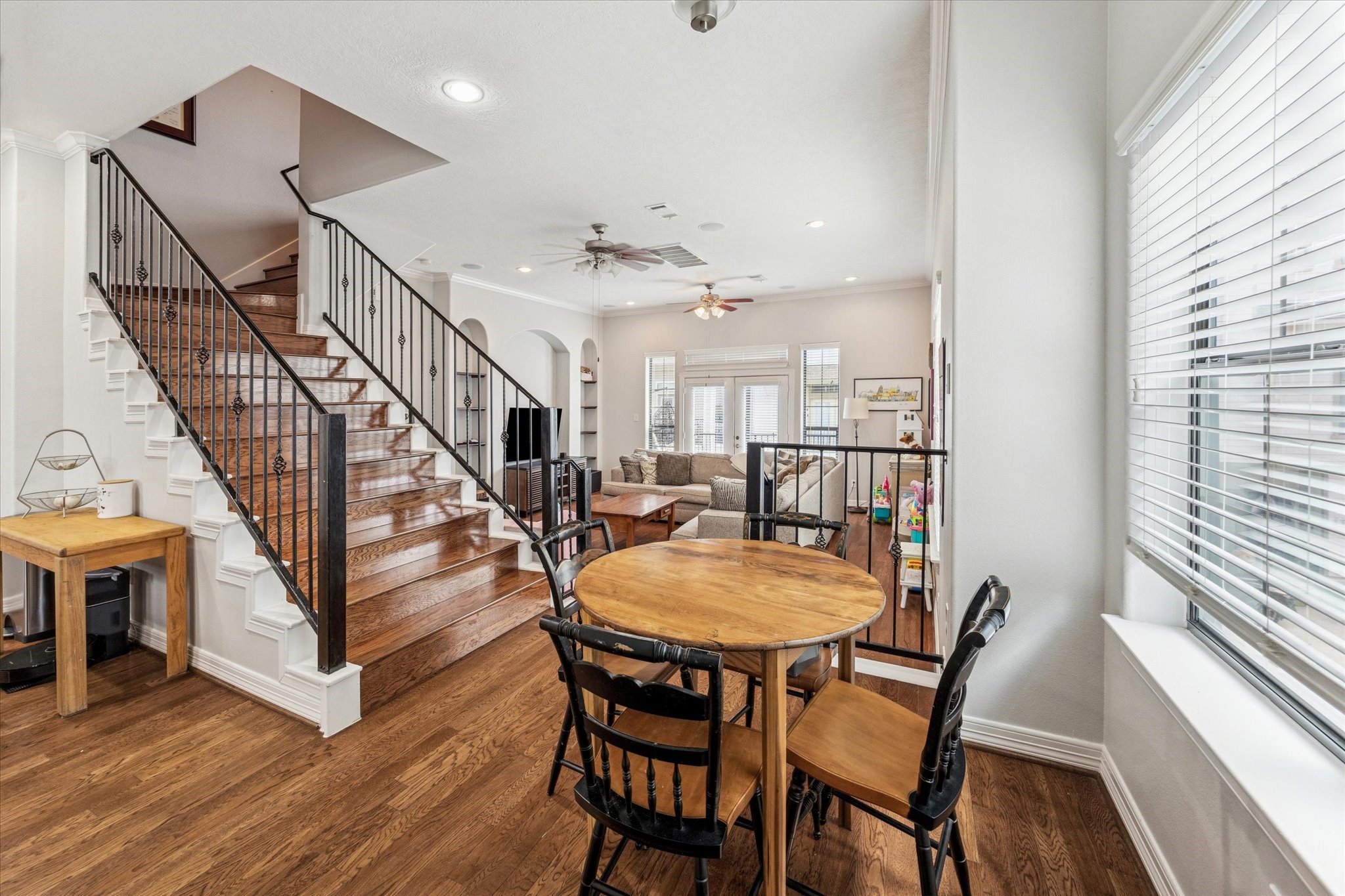 3203 Garden Oaks View Houston, TX 77018 - Photo 4 of 13 a dining room with chandelier and wooden floor