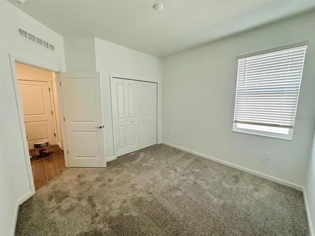 an empty room with closet