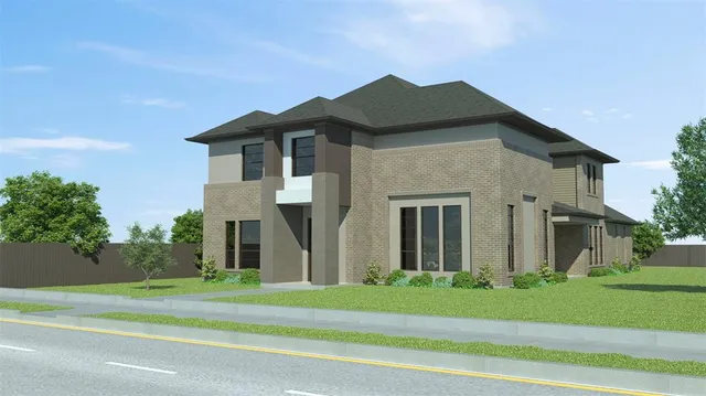 a view of a white house next to a yard with big trees