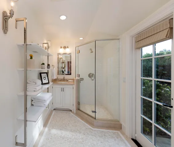 a bathroom with a shower tub and sink