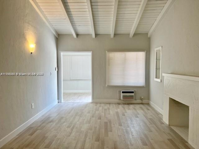 2139 Southwest 5th Street Miami, FL 33135 - Photo 12 of 19 a view of empty room with wooden floor and fan