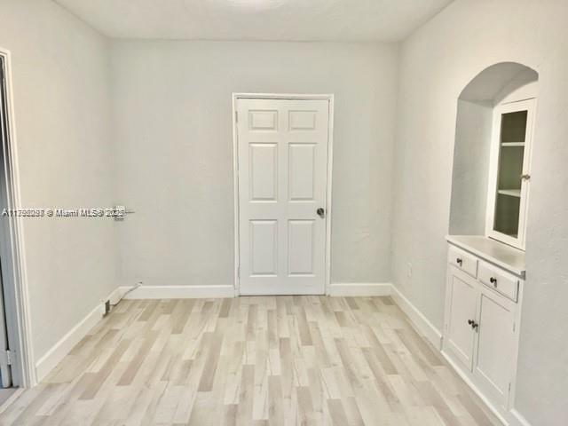 2139 Southwest 5th Street Miami, FL 33135 - Photo 15 of 19 a view of walk in closet with empty racks