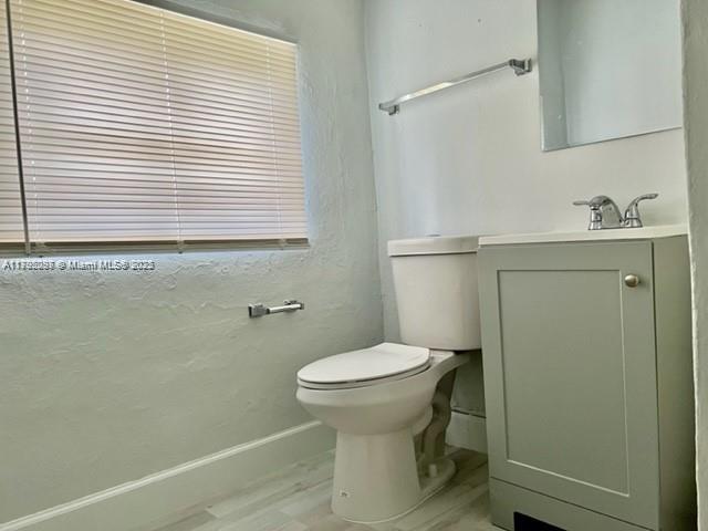 2139 Southwest 5th Street Miami, FL 33135 - Photo 16 of 19 a bathroom with a toilet and a sink