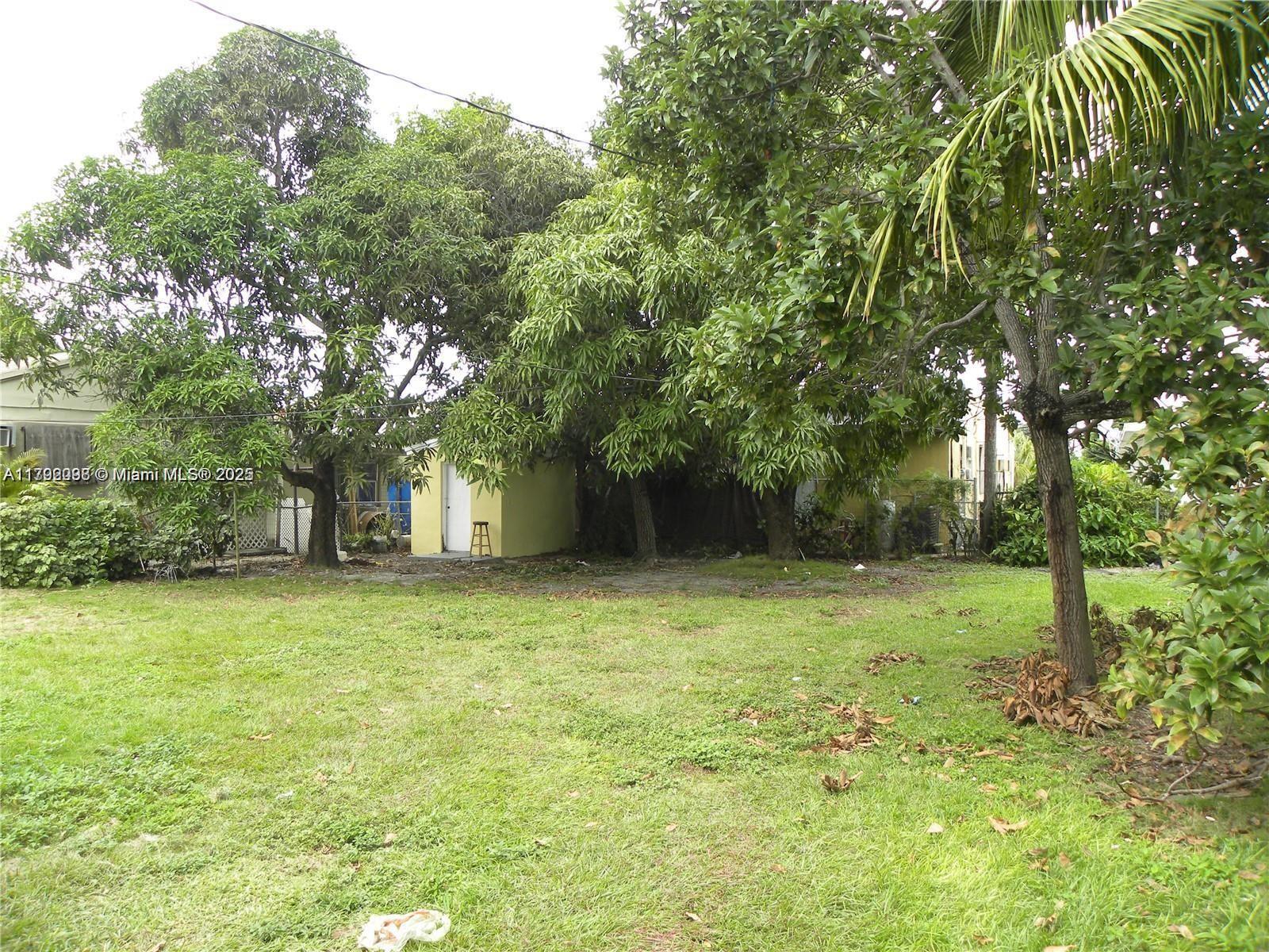 2139 Southwest 5th Street Miami, FL 33135 - Photo 8 of 19 a fire hydrant in the middle of a field