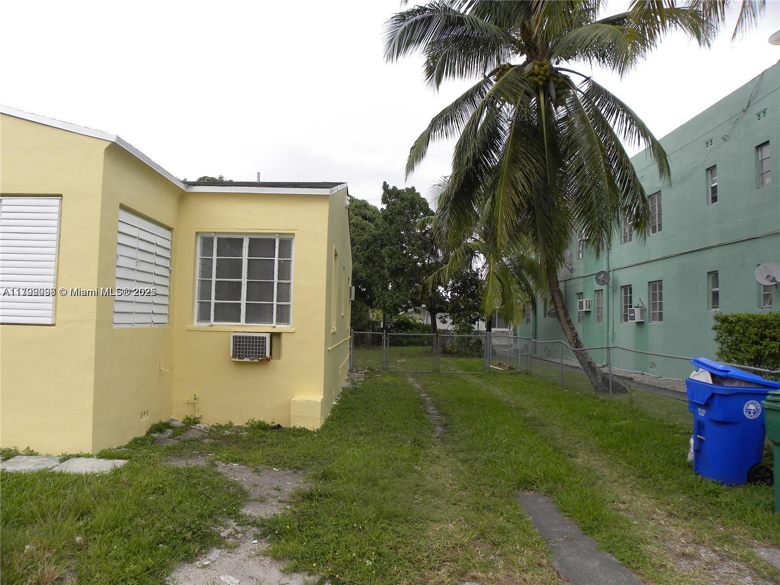 2139 Southwest 5th Street Miami, FL 33135 - Photo 10 of 19 a view of a house with a yard