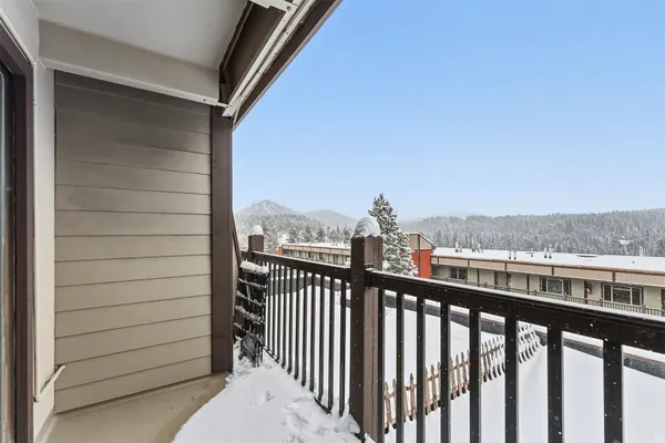 a view of a balcony with an outdoor space