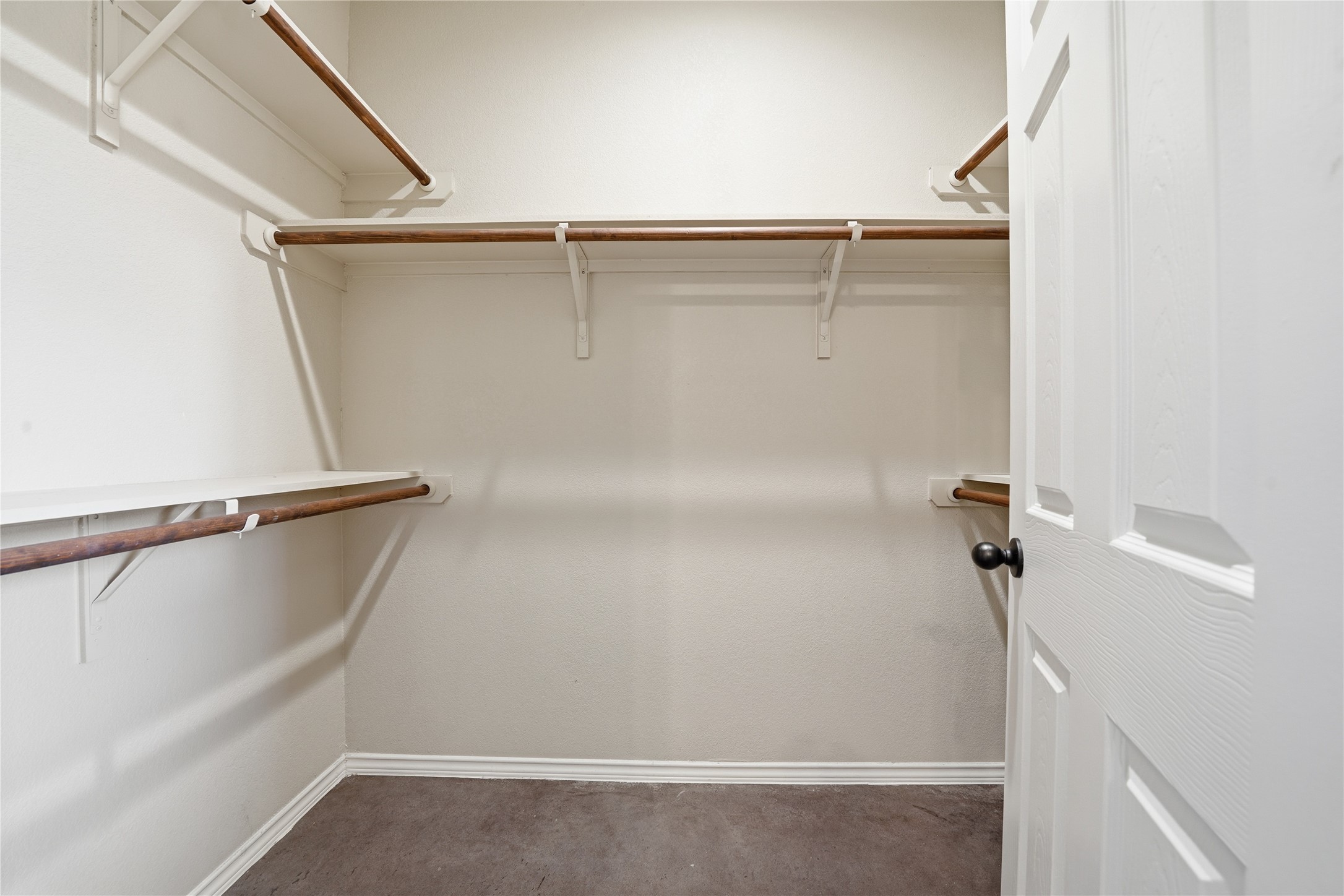 533 Jack Rabbit Lane, Unit A Buda, TX 78610 - Photo 26 of 34 A generously proportioned closet offers versatile shelving and hanging space, perfect for organization.