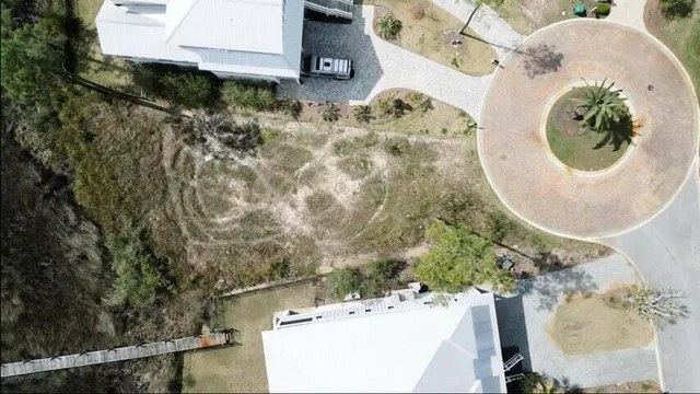 an aerial view of a house with a swimming pool