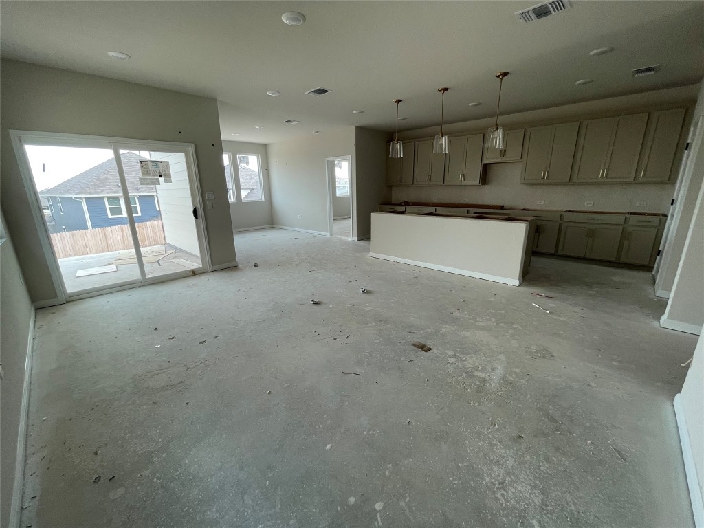 604 Palo Brea Loop Hutto, TX 78634 - Photo 11 of 36 a view of a kitchen with a sink and cabinets