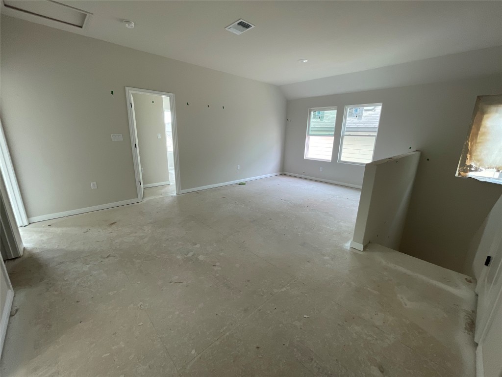 604 Palo Brea Loop Hutto, TX 78634 - Photo 23 of 36 an empty room with windows and closet