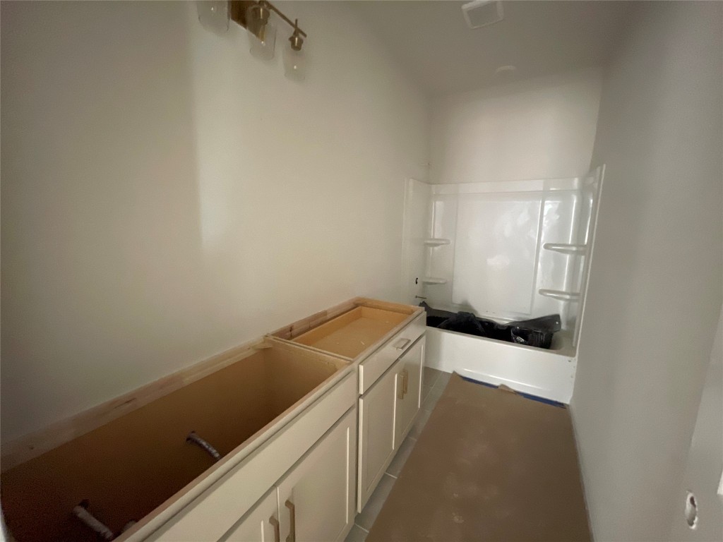 604 Palo Brea Loop Hutto, TX 78634 - Photo 25 of 36 a utility room with dryer and washer