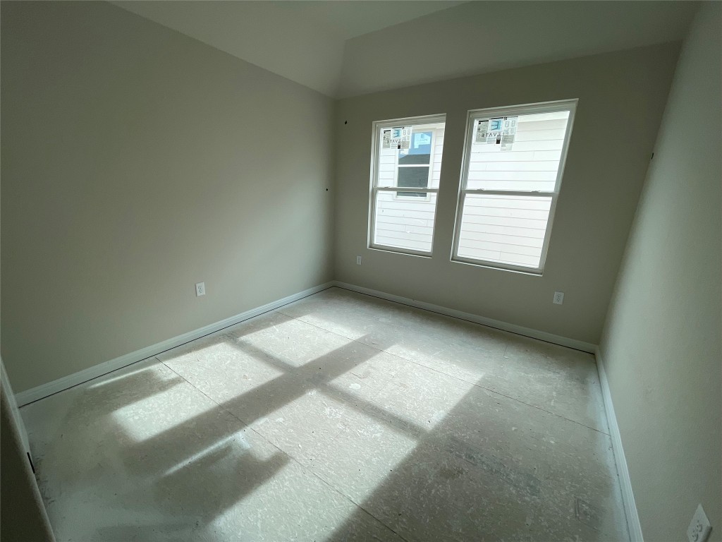 604 Palo Brea Loop Hutto, TX 78634 - Photo 26 of 36 an empty room with a window