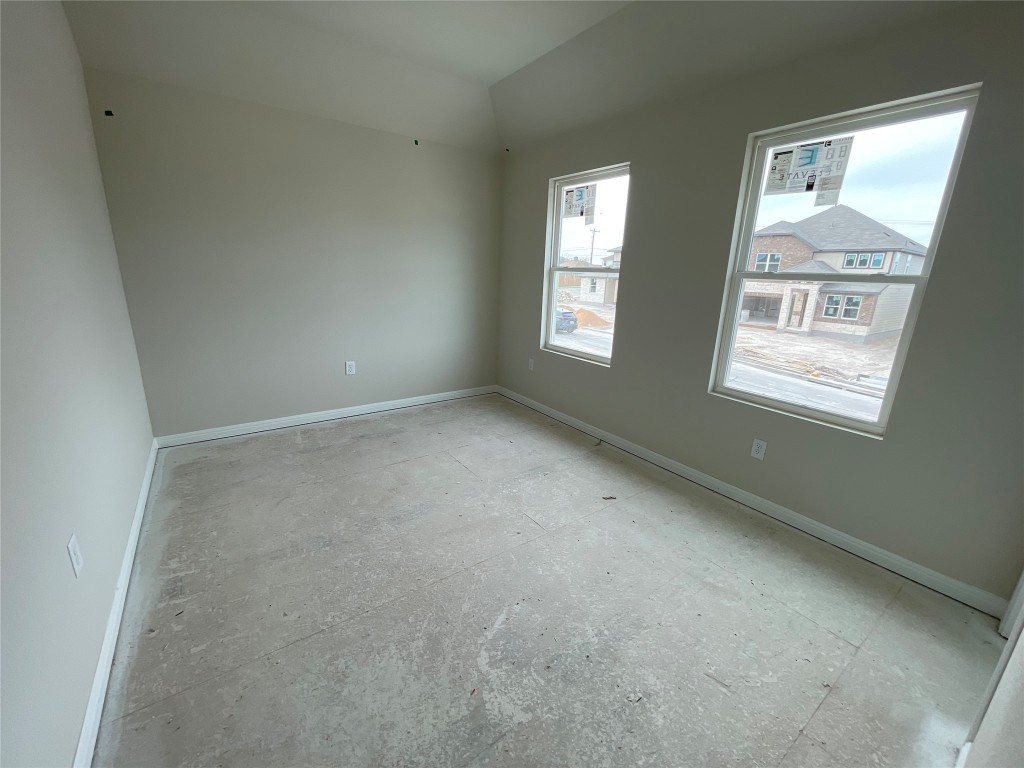 604 Palo Brea Loop Hutto, TX 78634 - Photo 28 of 36 an empty room with windows
