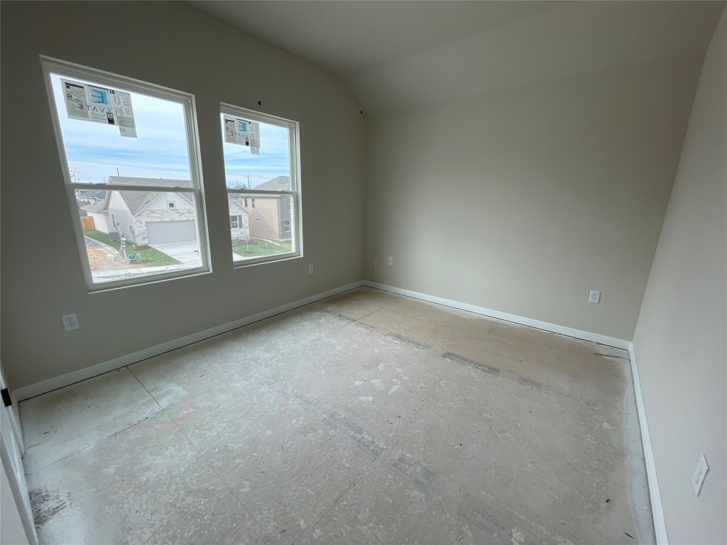 604 Palo Brea Loop Hutto, TX 78634 - Photo 30 of 36 an empty room with windows