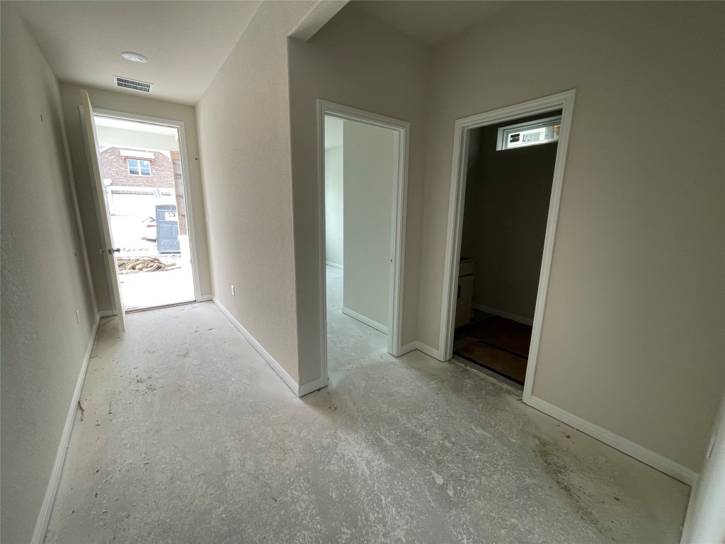 604 Palo Brea Loop Hutto, TX 78634 - Photo 6 of 36 an empty room with closet and a bathroom