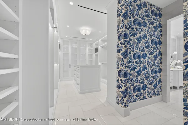 a view of a swimming pool with an outdoor space and seating area