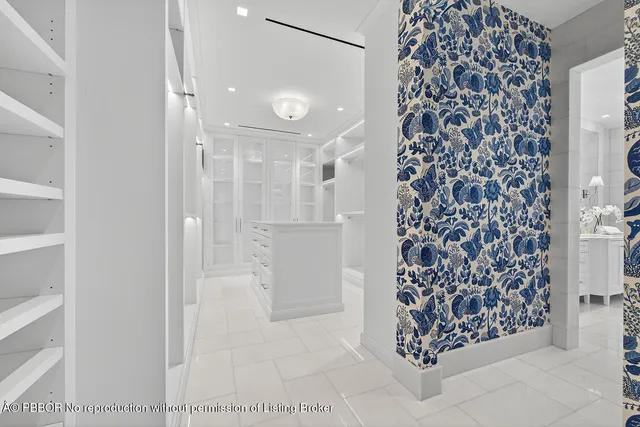 a view of a swimming pool with an outdoor space and seating area