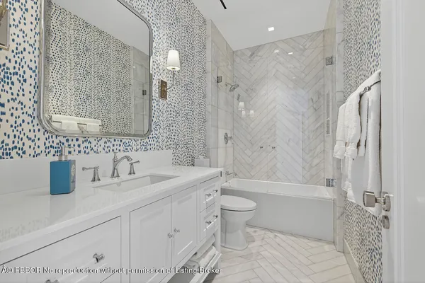 a view of a swimming pool with a table and chairs