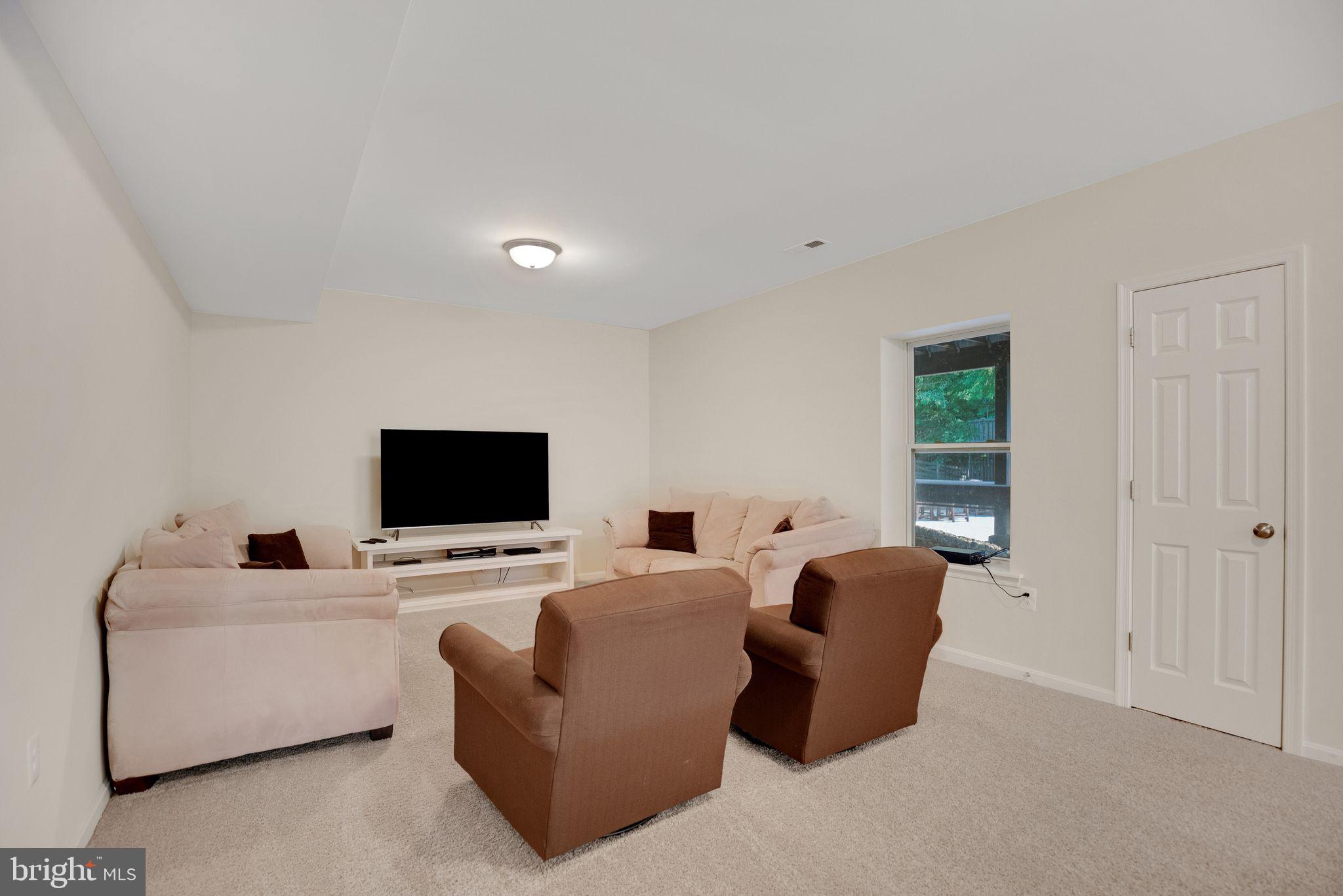 2058 Baythorne Road Prince Frederick, MD 20678 - Photo 30 of 51 Lower level rec room.