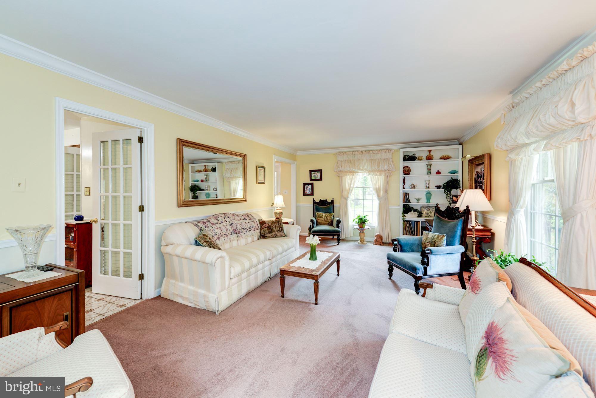 6016 Chapman Road Lorton, VA 22079 - Photo 12 of 47 Large family room exits to the huge screened porch