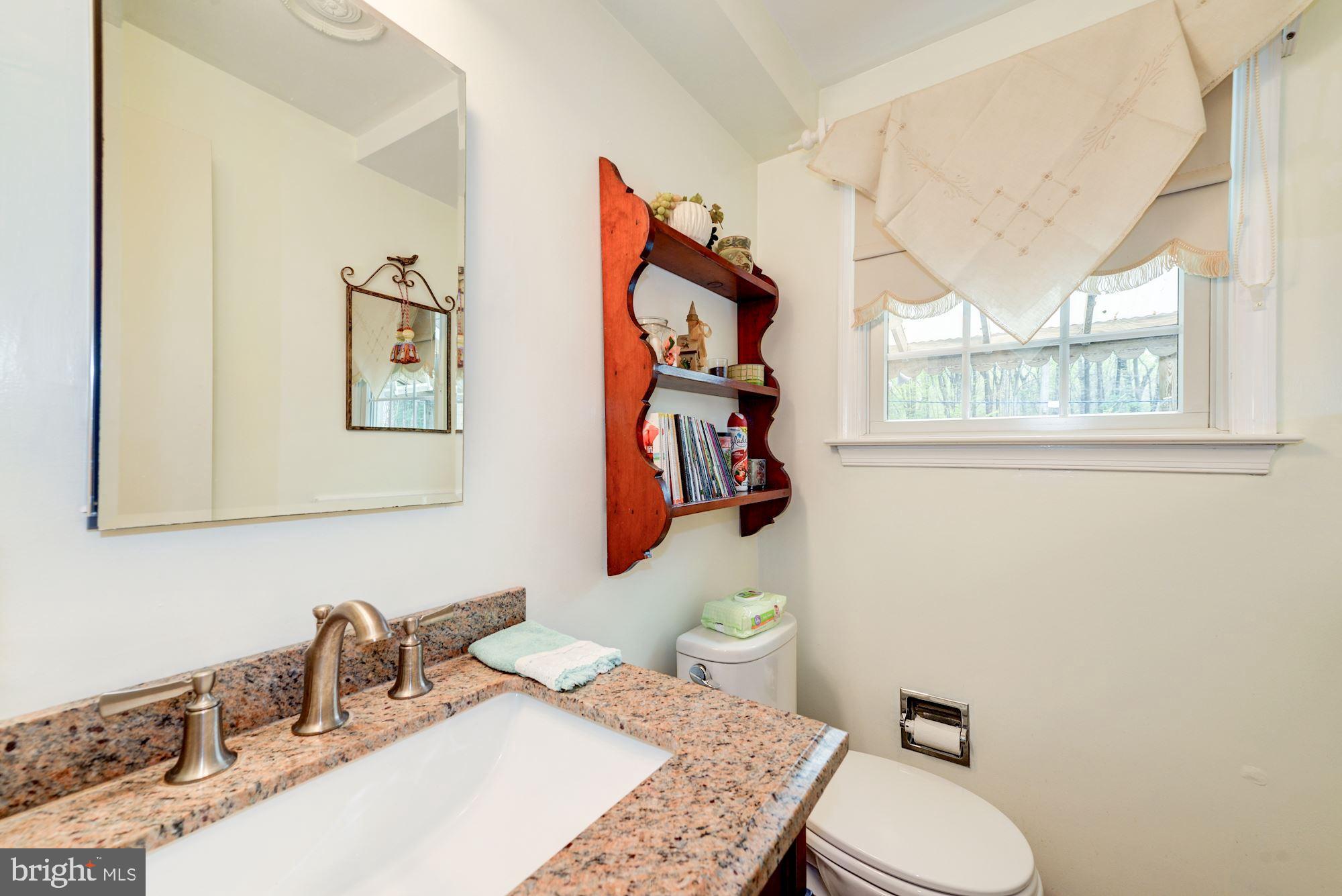 6016 Chapman Road Lorton, VA 22079 - Photo 14 of 47 Updated powder room off the kitchen
