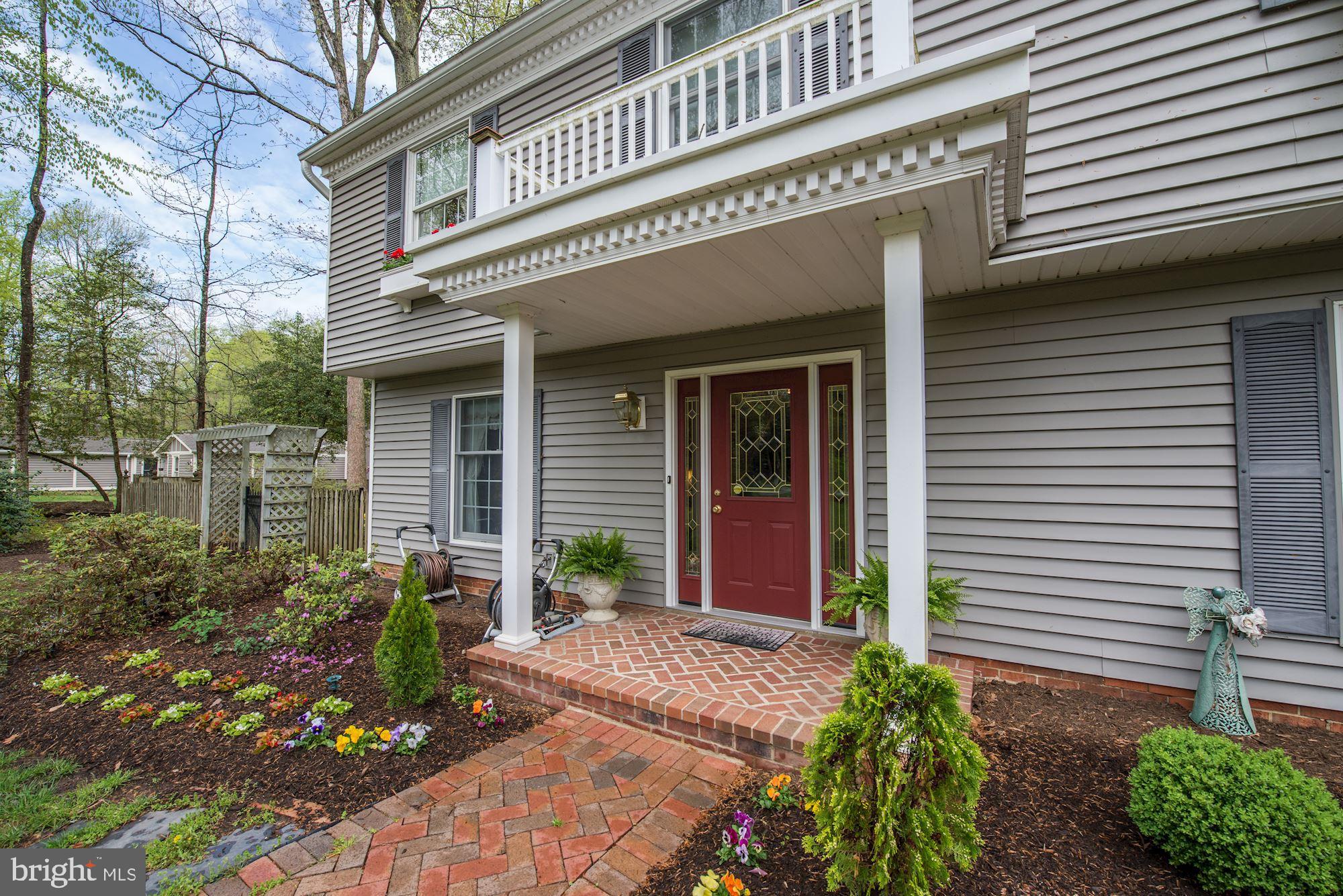 6016 Chapman Road Lorton, VA 22079 - Photo 3 of 47 Bricked walkway and new landscaping.