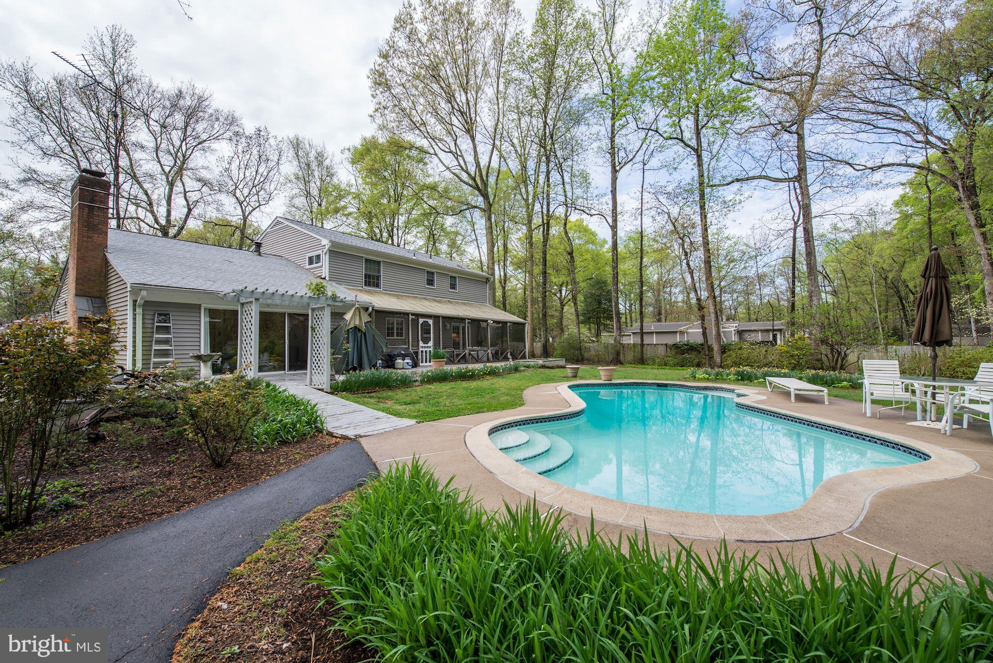 6016 Chapman Road Lorton, VA 22079 - Photo 29 of 47 Heated pool overlooks 1-acre lot
