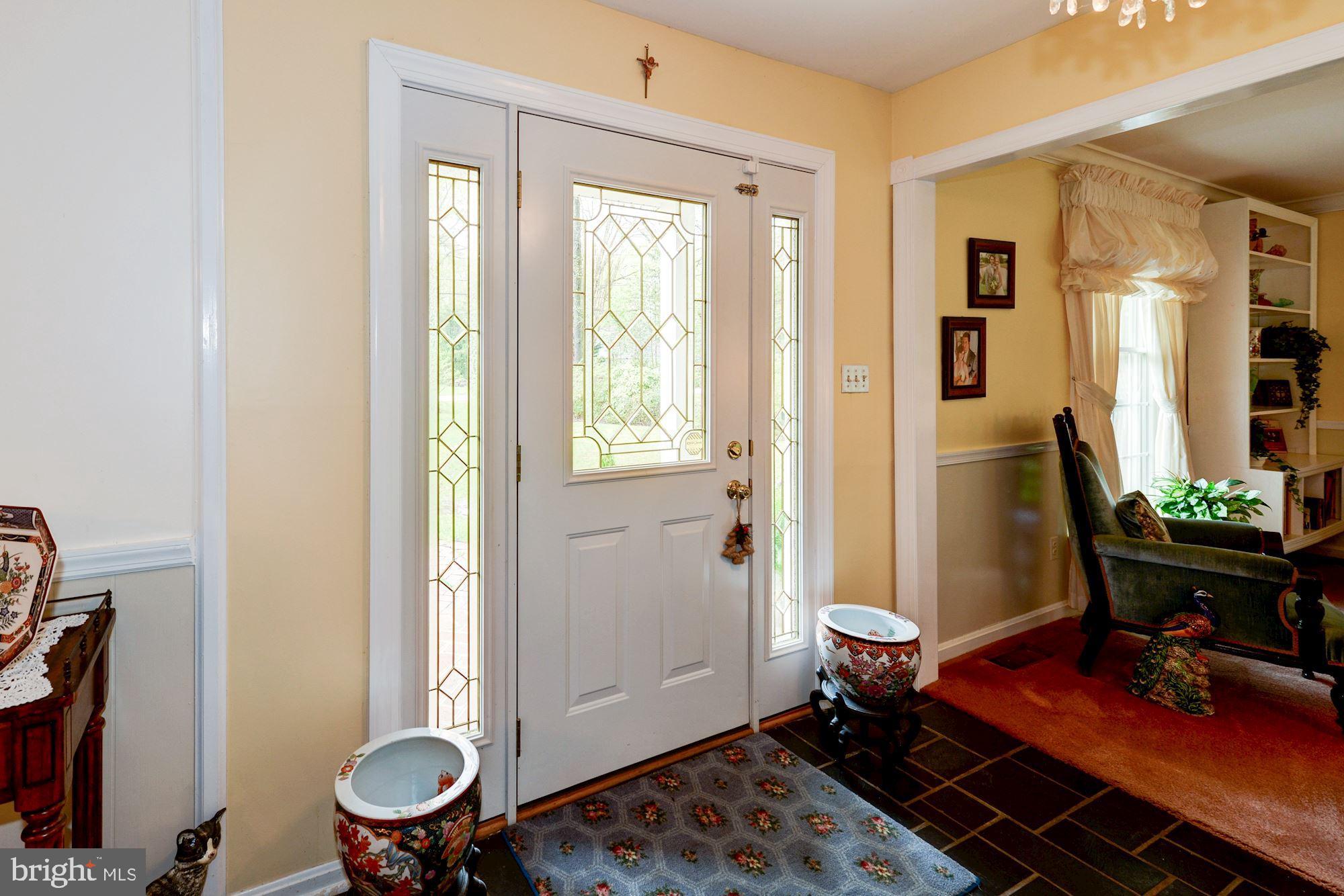 6016 Chapman Road Lorton, VA 22079 - Photo 7 of 47 Airy front entrance with plenty of light.