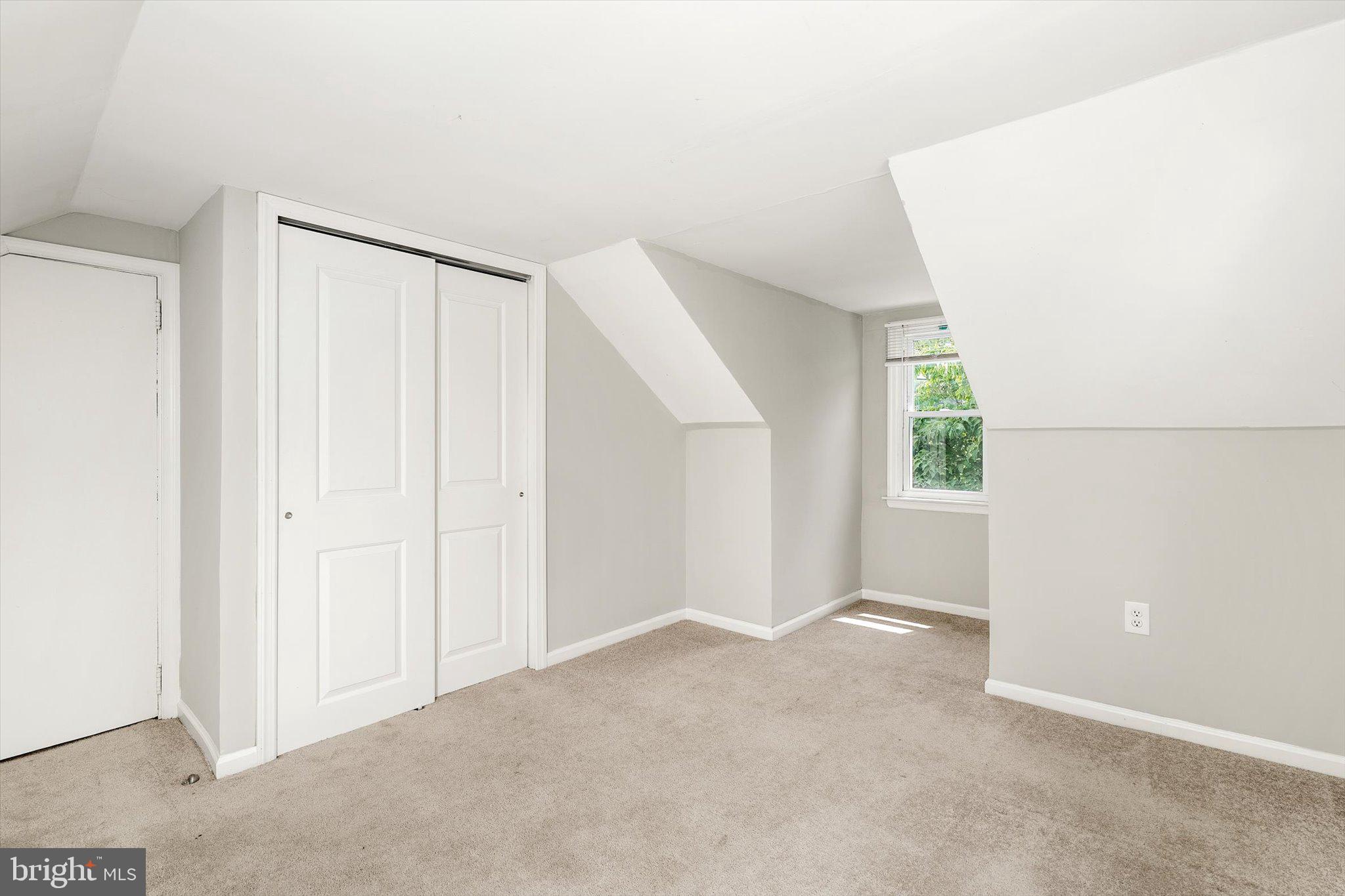 415 Pine Street Florence, NJ 08518 - Photo 16 of 25 a view of an empty room with a window