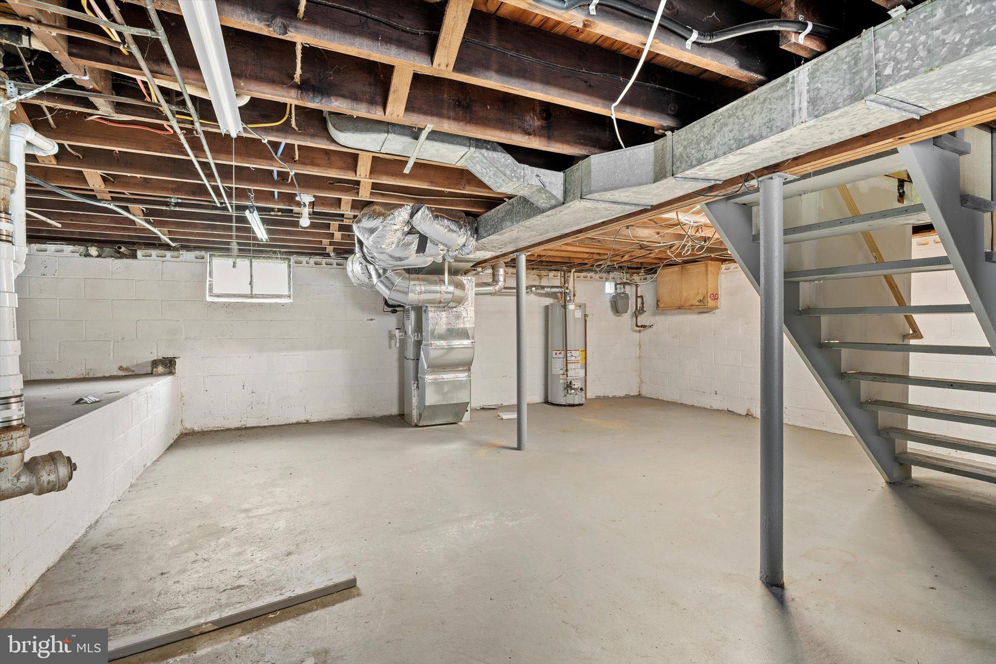 415 Pine Street Florence, NJ 08518 - Photo 21 of 25 a view of a room with racks on the wall