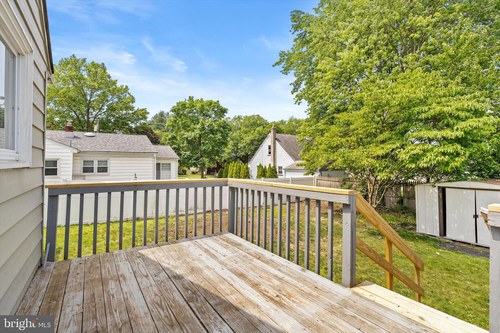 415 Pine Street Florence, NJ 08518 - Photo 22 of 25 a view of balcony with wooden floor and fence