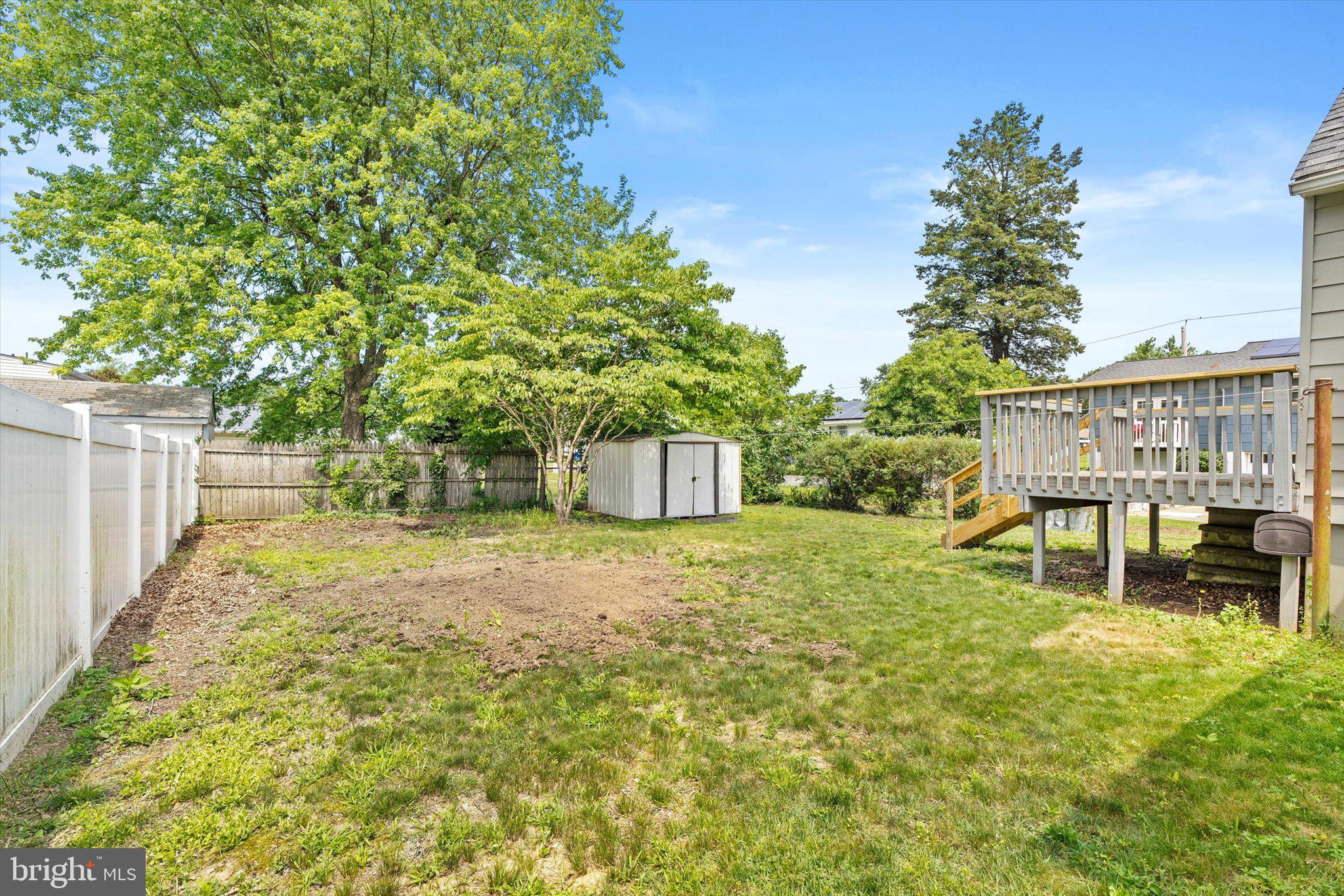 415 Pine Street Florence, NJ 08518 - Photo 24 of 25 a backyard of a house with table and chairs
