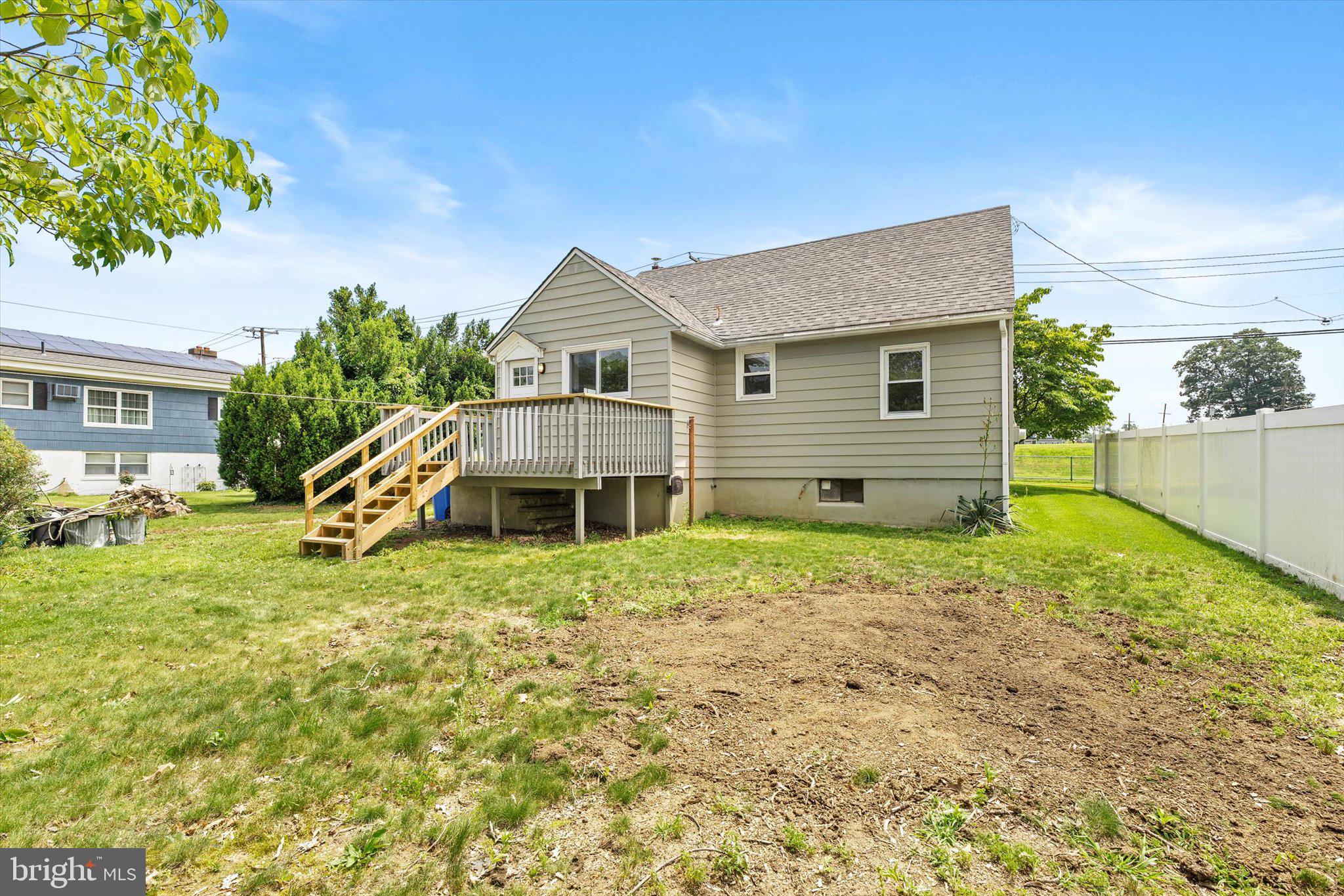 415 Pine Street Florence, NJ 08518 - Photo 25 of 25 a house with green field in front of it