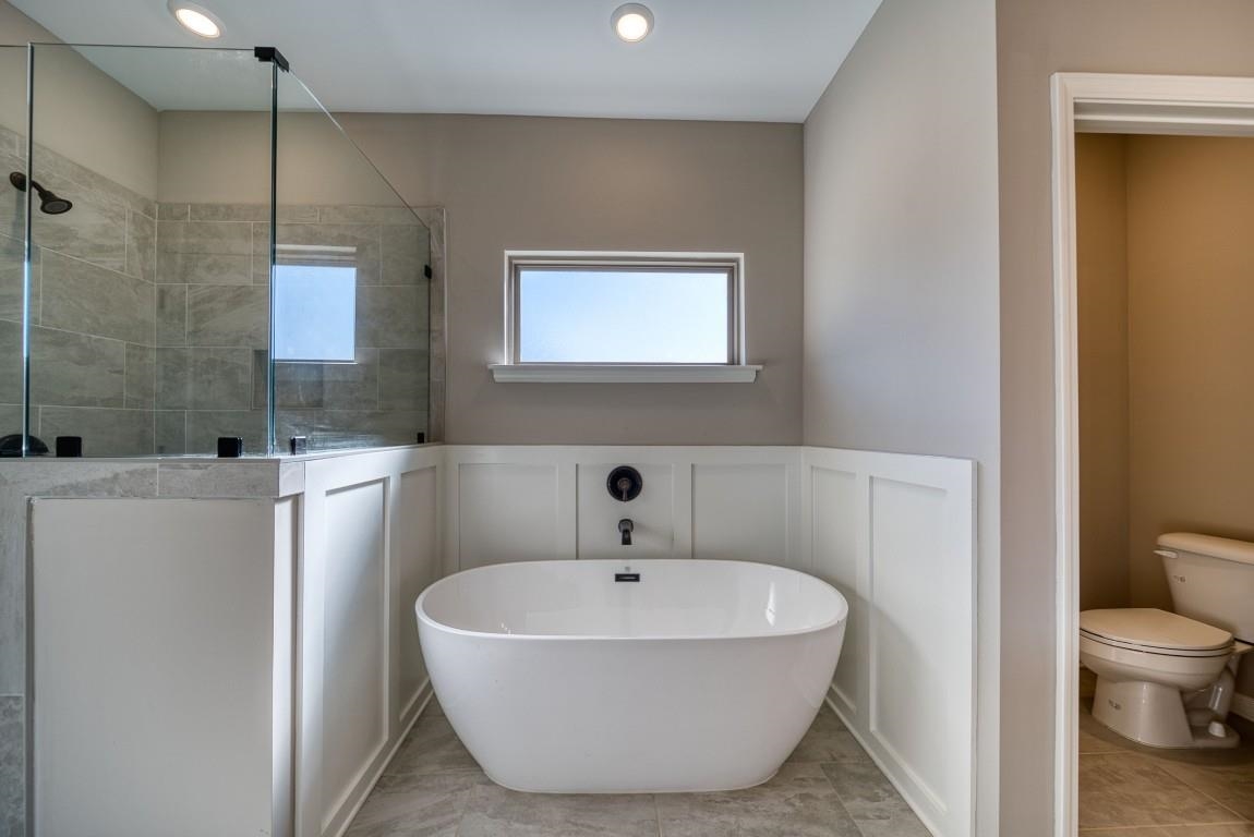 142 Como Lane Atoka, TN 38004 - Photo 11 of 33 a bathroom with a sink a toilet and shower