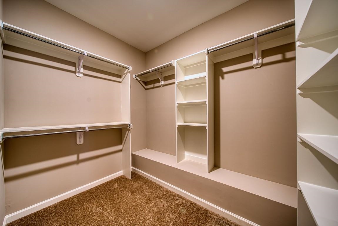 142 Como Lane Atoka, TN 38004 - Photo 14 of 33 a view of walk in closet with empty racks